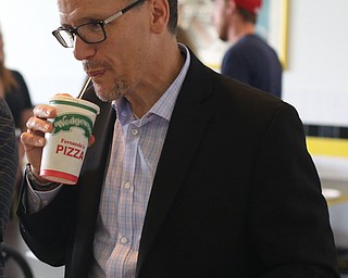 Democratic National Committee (DNC) chairman Tom Perez has a slice of pizza after speaking at Wedgewood Pizza, Friday, June 9, 2017 in Boardman. Perez visited Ohio two days after President Donald Trump spoke in Cincinnati, which Perez stopped in on Thursday...(Nikos Frazier | The Vindicator)