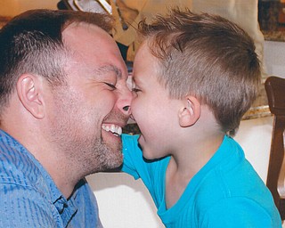 Chris Prater of New Middletown, with his 5 year-old son, Camden.
