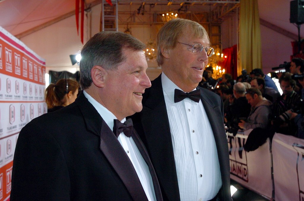 FILE - In this March 19, 2006 file photo, Burt Ward, left, and Adam West pose for photos while walking the red carpet prior to the TV Land Awards, in Santa Monica, Calif. On Saturday, June 10, 2017, Westâ€™s family said the actor, who portrayed Batman in a 1960s TV series, has died at age 88. (Andy Holzman/Los Angeles Daily News via AP)