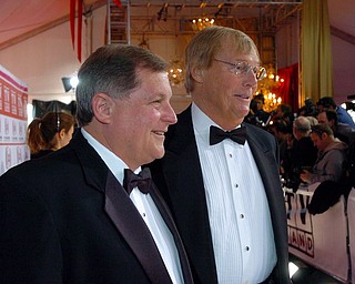 FILE - In this March 19, 2006 file photo, Burt Ward, left, and Adam West pose for photos while walking the red carpet prior to the TV Land Awards, in Santa Monica, Calif. On Saturday, June 10, 2017, Westâ€™s family said the actor, who portrayed Batman in a 1960s TV series, has died at age 88. (Andy Holzman/Los Angeles Daily News via AP)