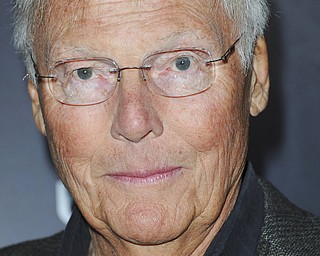 FILE- In this Nov. 17, 2012 file photo, Adam West arrives at Variety Power of Comedy at Avalon Hollywood in Los Angeles. 10, 2017. On Saturday, June 10, 2017, his family said the actor, who portrayed Batman in a 1960s TV series, has died at age 88. (Photo by Richard Shotwell/Invision/AP, File)