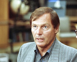 FILE - This June 14, 1989 file photo shows Adam West in New York. On Saturday, June 10, 2017, his family said the actor, who portrayed Batman in a 1960s TV series, has died at age 88. (AP Photo/Richard Drew, File)