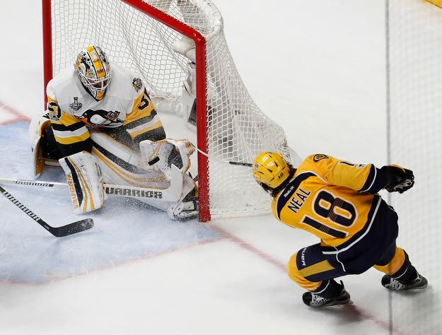 Pittsburgh Penguins goalie Matt Murray (30) blocks a shot by Nashville Predators' James Neal (18) during the second period of Game 6 of the NHL hockey Stanley Cup Final, Sunday, June 11, 2017, in Nashville, Tenn. (AP Photo/Jeff Roberson)