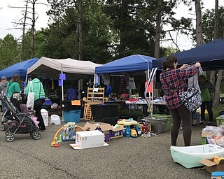 Neighbors | Alexis Bartolomucci.Guests at the Baby Bargain Boutique on May 20 at Boardman Park looked at the different products people were selling.