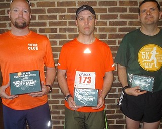 Neighbors | Submitted.The Men's Master's winners of the 22nd annual Austintown Lions 5-K on May 13 were, from left, Everett Briggs (first, Youngstown), Tim Hertel (second, Akron) and Heath Morgan (third, Alliance).