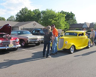 Neighbors | Alexis Bartolomucci.Guests looked at the cars on displayed on May 30 at the Austintown Senior Center for the Tuesday Nite Car Cruise hosted by the Mahoning Valley Olde Car Club.