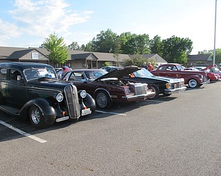 Neighbors | Alexis Bartolomucci.Cars lined up in the parking lot of the Austintown Senior Center on May 31 for the Mahoning Valley Olde Car Club car cruise.