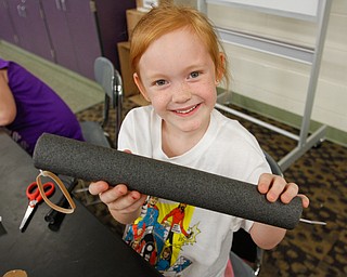        ROBERT K. YOSAY  | THE VINDICATOR..Isabella Dorney  first grader.. shows off her rocket ..Camp Invention is for kids in K-6 - It aims to empower the next generation of innovators by exploring the results of turning ideas into inventions and bringing those inventions to market..