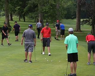 Players warm up on the putting green before the Greatest Golfer of the Valley Junior Qualifier at Tam O'Shanter Golf Course, Thursday, June 15, 2017 in Hermitage...(Nikos Frazier | The Vindicator)