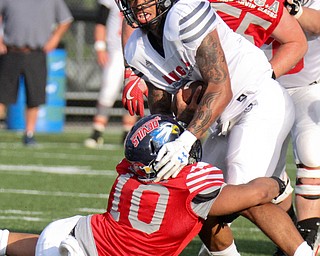 William D Lewis the vindicator  Trumbull's Lynn Bowden(1) of Harding is stopped by Mahoning's Lawrence Harrington (10) of Fitch.
