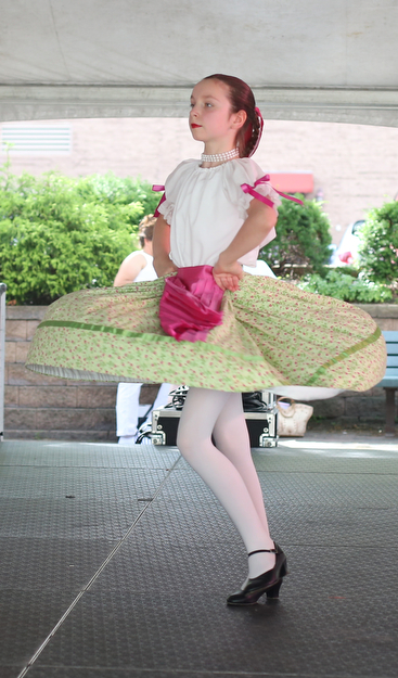 Anna Kosol(11) of Moon Township, Pa. performs with the  Slavjane Folk Ensemble perform during the Simply Slavic Festival at Federal Plaza East, Saturday, June 17, 2017 in downtown Youngstown...(Nikos Frazier | The Vindicator)