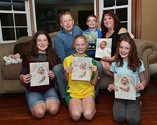 On Robert MoralesÕ desk is a certificate of recognition for 20 years of service to General Motors and the United Auto Workers..Without having an autoworker father, Morales, 46, doesnÕt know if he would have that certificate or the title as president of UAW Local 1714..ÒIÕve been elected four different times,Ó he said. ÒI think [my dad] would be very proud. I learned a lot through my dad. I am proud to say that I had the opportunity to know him.Ó.ItÕs a story of the Mahoning Valley. Generations of blue-collar workers have followed in their fatherÕs footsteps. Together they produced steel, built cars and fabricated metal for various industries.