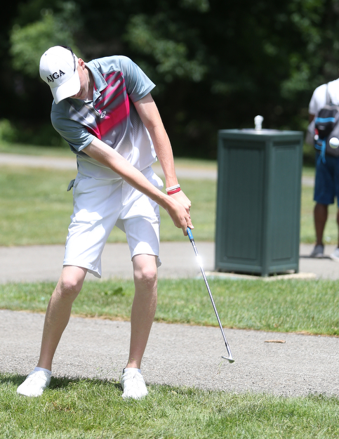 Conner Stevens chips onto the green after bouncing a ball into a golf cart on hole 16 during the first round of the AJGA Mill Creek Foundation Junior All-Star, Tuesday, June 2017, 2017 at Mill Creek Golf Course. ..(Nikos Frazier | The Vindicator)..