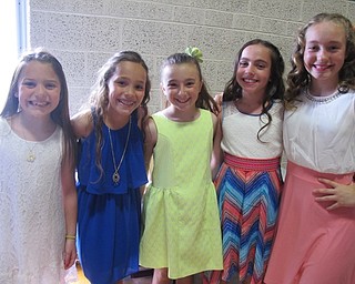 Neighbors | Alexis Bartolomucci.Dobbins fourth-grade students waited in line for the photobooth during the Fourth Grade Celebration on May 23 at Poland Middle School.