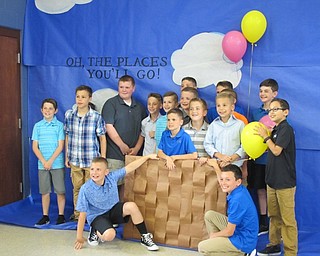 Neighbors | Alexis Bartolomucci.Classmates from Dobbins Elementary took pictures in front of the backdrop during the Fourth Grade Celebration event on May 23 at Poland Middle School.