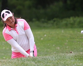 Sophie Zhang-Murphy of Beijing chips the ball out of a sand trap on hole 15 during the third and final round of the AJGA Mill Creek Foundation Junior All-Star, Thursday, June 22, 2017 at Mill Creek Golf Course. ..(Nikos Frazier | The Vindicator)..