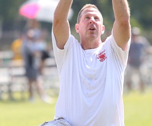 YSU Football head coach Bo Pelini catches the ball during the Cardinal Mooney Football Camp at Cardinal Mooney High School, Thursday, June 22, 2017 in Youngstown...(Nikos Frazier | The Vindicator)