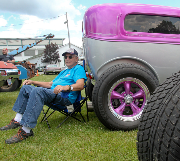 William D. Lewis The Vindicator  Bob Evans of Austintown relaxes with his 1931 Ford Model - A at the Hot Rod Super Nationals at the Canfield Fairgrounds 6-24-17.