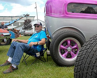 William D. Lewis The Vindicator  Bob Evans of Austintown relaxes with his 1931 Ford Model - A at the Hot Rod Super Nationals at the Canfield Fairgrounds 6-24-17.