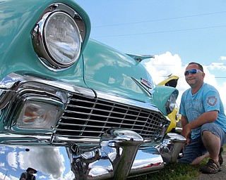 William D. Lewis The Vindicator  Dan Patrone a longtime car enthusiast  from Poland, is all smiles as he shows his 1956 Chevy at the Hot Rod Super Nationals 6-24-17 at the Canfield Fairgrounds.