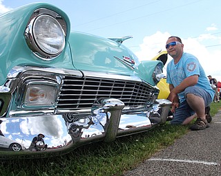 William D. Lewis The Vindicator  Dan Patrone a longtime car enthusiast  from Poland, is all smiles as he shows his 1956 Chevy at the Hot Rod Super Nationals 6-24-17 at the Canfield Fairgrounds.