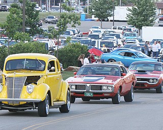 William D. Lewis The Vindicator   Classic cars and hot rods make their way along 224 from the fairgrounds to SP Mall for Hot Rod Super NAtionals afterparty 6-24-17.
