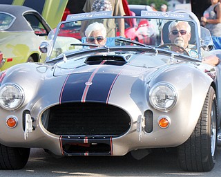 William D. Lewis The Vindicator   Don and Benita Fisher of Poland in their Cobra at SP Mall for Hot Rod Super Nationals afterparty 6-24-17. The car is a relica of a 1965 Cobra built by Factory Five Racing..