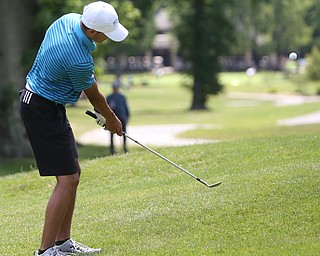 Jimmy Graham chips on hole 10 during the Greatest Golfer of the Valley Junior Qualifier on the North Course at Mill Creek Golf Course, Wednesday, June 28, 2017 at Mill Creek Golf Course. ..(Nikos Frazier | The Vindicator)..