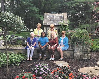 The Columbiana Women’s Club will host “Dishin’ Dirt,” a lunch and learn symposium with garden design experts, at The Gardens at Hippley Village, 547 N. Main St. from 11 a.m. to 2 p.m., Saturday. Featured presenter will be Keith Kaiser, horticulture consultant, who will create a garden container to be auctioned at the event. The cost is $25. A box lunch will be served under a tent. Reservations may be made by calling the Women’s Club at 330-482-2832, or Donna Bekar at 330-482-2267. Parking and a shuttle will be available from First Christian Church, 39 Cherry St. and on Stanton Avenue. Above, from left, are Bekar, Jenelle Martin, Kathy Reash and Vaughn Musser. Standing from left, Bobbi Hughes and Pat Tingle.