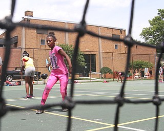 William D. Lewis The vindicator Erin McClendon, 8,, of Youngstown participates in a tennis program at he JCC 6-29-17.