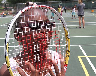 William D. Lewis The vindicator  Mariahkelis Mauldin,9, of Youngstown participates in a tennis program at he JCC 6-29-17.