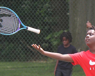William D. Lewis The vindicator  Mason Woodall, 10, of Youngstown participates in a tennis program at he JCC 6-29-17.
