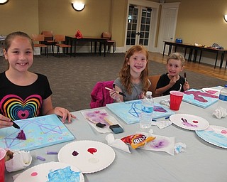 Neighbors | Alexis Bartolomucci.Children painted a kite painting on canvas provided by the Poland library for the Paint Party on May 22.