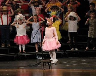 Neighbors | Abby Slanker.On May 31, a C.H. Campbell Elementary School kindergartner, dressed as a barnyard piggy, took her turn at the microphone during the school’s annual performance of “E-I-E-I Oops!” at Canfield High School.