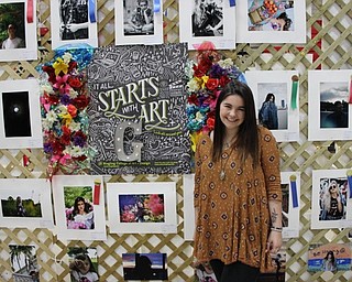 Neighbors | Abby Slanker.Canfield Local Schools Student Art Show second runner up Gabby Scianna displayed several of her photography pieces at a booth set up the annual show on May 24.