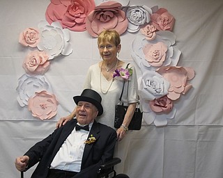 Neighbors | Alexis Bartolomucci.William and Trudi Fischer attended the Brookdale prom event on June 8 and stood in front of the back drop to get their picture taken.