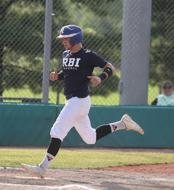 Roth runner Timmy Sumner(37) scores a run during the 1st inning as Roth Brothers takes on Baird Brothers, Friday, June 30, 2017 at Bob Cene Park. Play was stopped in the 6th inning due to a lightning delay then never resumed because of heavy rain...(Nikos Frazier | The Vindicator)..