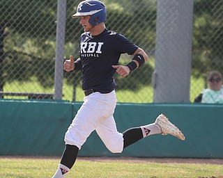 Roth runner Timmy Sumner(37) scores a run during the 1st inning as Roth Brothers takes on Baird Brothers, Friday, June 30, 2017 at Bob Cene Park. Play was stopped in the 6th inning due to a lightning delay then never resumed because of heavy rain...(Nikos Frazier | The Vindicator)..