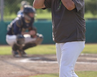 Baird coach Cliff Phillips holds his head after a call during the 2nd inning as Roth Brothers takes on Baird Brothers, Friday, June 30, 2017 at Bob Cene Park. Play was stopped in the 6th inning due to a lightning delay then never resumed because of heavy rain...(Nikos Frazier | The Vindicator)..