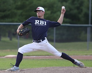 Roth pitcher Aaron Woodberry(9) pitches during the 2nd inning as Roth Brothers takes on Baird Brothers, Friday, June 30, 2017 at Bob Cene Park. Play was stopped in the 6th inning due to a lightning delay then never resumed because of heavy rain...(Nikos Frazier | The Vindicator)..