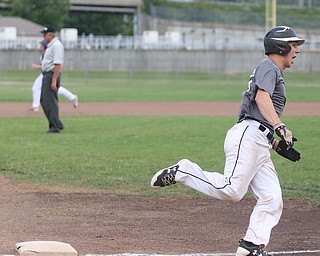 Baird runner Coleman Stauffer(20) rounds third during the 3rd inning as Roth Brothers takes on Baird Brothers, Friday, June 30, 2017 at Bob Cene Park. Play was stopped in the 6th inning due to a lightning delay then never resumed because of heavy rain...(Nikos Frazier | The Vindicator)..