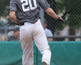Baird runner Coleman Stauffer(20) scores a run during the 3rd inning as Roth Brothers takes on Baird Brothers, Friday, June 30, 2017 at Bob Cene Park. Play was stopped in the 6th inning due to a lightning delay then never resumed because of heavy rain...(Nikos Frazier | The Vindicator)..