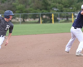 Baird runner Dom Bucko(5) looks at Roth third baseman Tyler Srbinovich(13) during the 3rd inning as Roth Brothers takes on Baird Brothers, Friday, June 30, 2017 at Bob Cene Park. Play was stopped in the 6th inning due to a lightning delay then never resumed because of heavy rain...(Nikos Frazier | The Vindicator)..