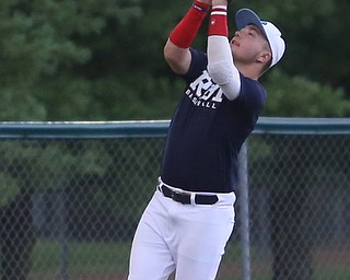 Roth third baseman Tyler Srbinovich(13) catches out the batter during the 6th inning as Roth Brothers takes on Baird Brothers, Friday, June 30, 2017 at Bob Cene Park. Play was stopped in the 6th inning due to a lightning delay then never resumed because of heavy rain...(Nikos Frazier | The Vindicator)..