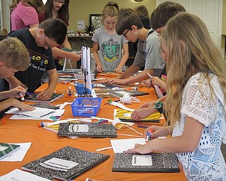 Neighbors | Alexis Bartolomucci.Each child got a logo of which Harry Potter school they belong in to decorate their wizard notebook with for the Hogwarts Summer School program.