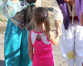 Arianna Smith(7) of Cortland meets Jasmine and Aladin during the Canfield Rotary Fireworks Fest at the Canfield Fair Grounds, Saturday, July 1, 2017 in Canfield...(Nikos Frazier | The Vindicator)