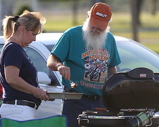 Ernie and Darlene Dellin of North Jackson BBQ before the fireworks during the Canfield Rotary Fireworks Fest at the Canfield Fair Grounds, Saturday, July 1, 2017 in Canfield...(Nikos Frazier | The Vindicator)