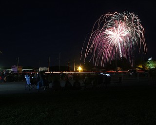 A long exposure shows the fireworks during the Canfield Rotary Fireworks Fest at the Canfield Fair Grounds, Saturday, July 1, 2017 in Canfield...(Nikos Frazier | The Vindicator)
