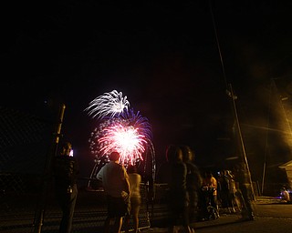 A long exposure shows the fireworks during the Canfield Rotary Fireworks Fest at the Canfield Fair Grounds, Saturday, July 1, 2017 in Canfield...(Nikos Frazier | The Vindicator)