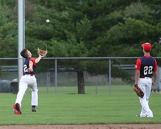 SBA Aces shortstop Anthony Coiffi (2) runs out for the out while SBA Aces second baseman Matt Costello (22) watches on during the 2nd inning as Astro Falcons takes on SBA Aces, Saturday, July 1, 2017 at Bob Cene Park. Astros won 6-0...(Nikos Frazier | The Vindicator)..